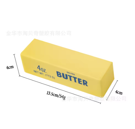 A yellow butter bar shown on a white background with dimension lines indicating 4 cm height, 13.5 cm length, and 4 cm width.