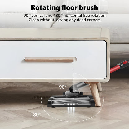 Vacuum cleaner with rotating floor brush cleaning under a piece of furniture.