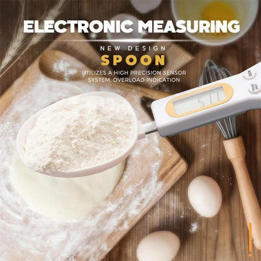 Electronic measuring spoon being used to measure flour on a wooden surface with eggs and a whisk.