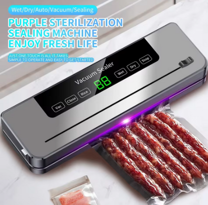A countertop vacuum sealer machine with a digital display and control buttons, shown sealing a clear plastic bag containing sliced sausage. The product is metallic silver with a black control panel, and purple light is emitted from the sealing area.