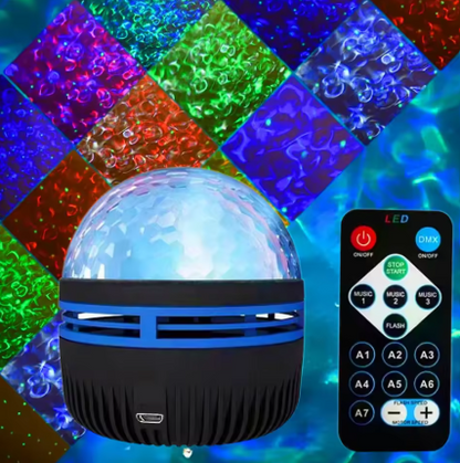 A portable USB LED disco ball speaker with a black ribbed base and a clear domed top, shown alongside its black remote control. The background features a colorful grid of projected light patterns in red, green, blue, and purple.
