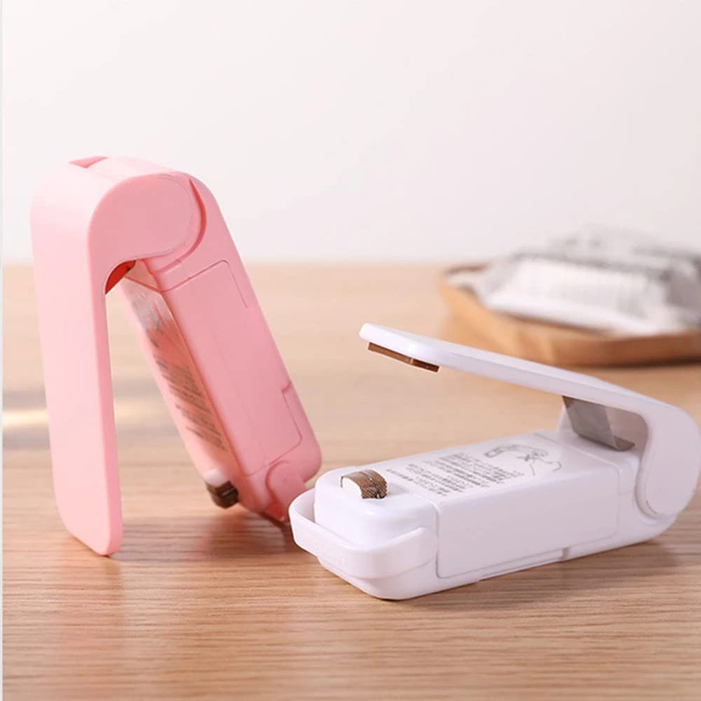 Pink and white kitchen tool on a wooden surface