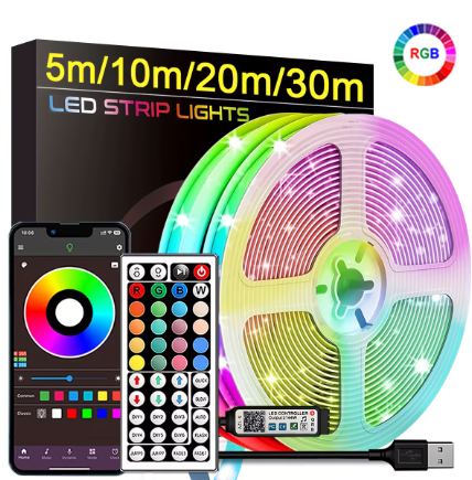 RGB LED strip light set shown with a coiled multicolor light strip, a USB cable, a remote control, a smartphone app screen, and the retail box on a white background.