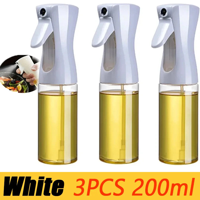 Three white oil sprayers with clear oil containers on a white background. Showing that they hold 200ml each