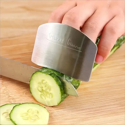 a knofe cutting a cucumber using the steel finger guard