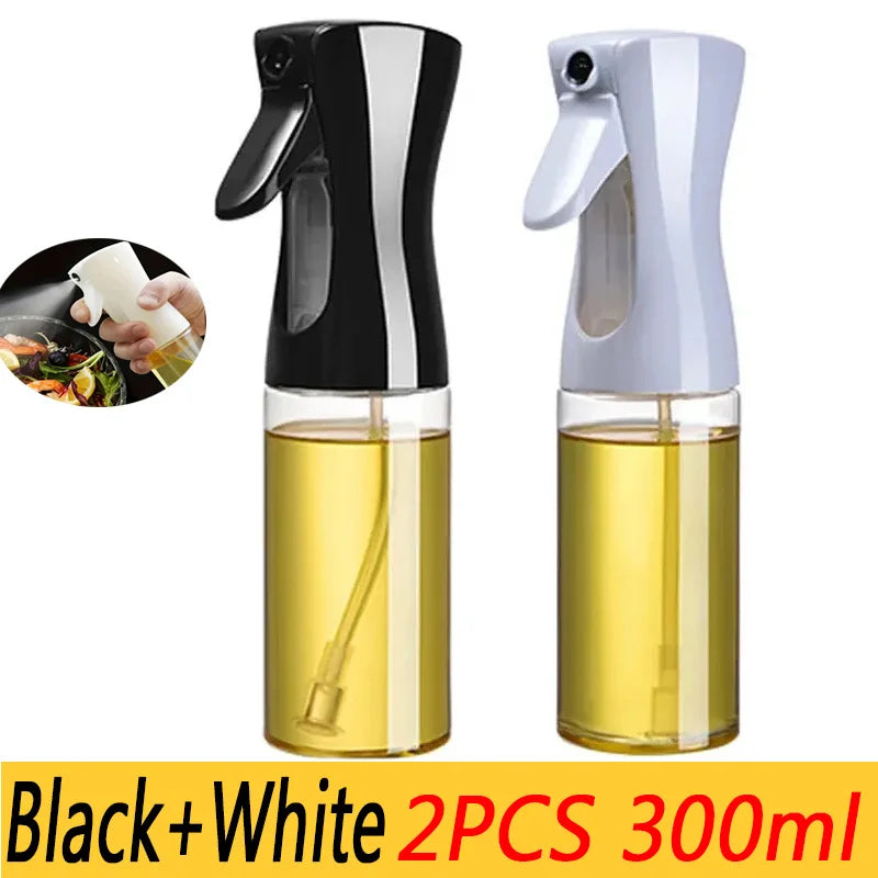 Two olive oil sprayers, one black and one white, with a close-up of a hand holding an oil sprayer in the corner. Showing that they hold 300ml each