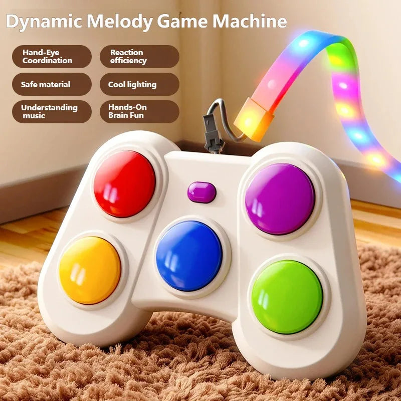 A white handheld toy game controller with colorful round buttons, shown on a brown shag rug with a glowing multicolor LED strap attached. Text on the left lists features like hand-eye coordination and safe material.