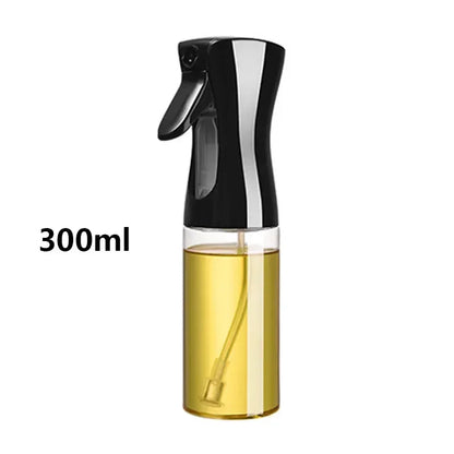 Spray bottle with black nozzle and clear body containing oil, labeled '300ml' on a white background.