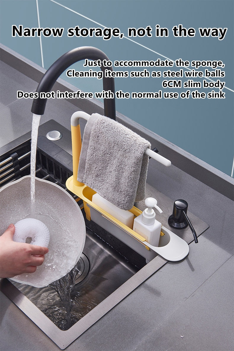 Sink caddy with towel holder and cleaning items in a kitchen setting