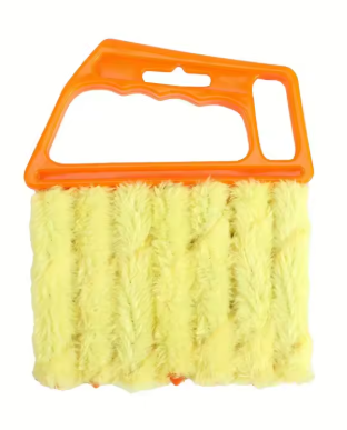 A yellow microfiber cleaning brush with a bright orange plastic handle, shown against a plain white background.